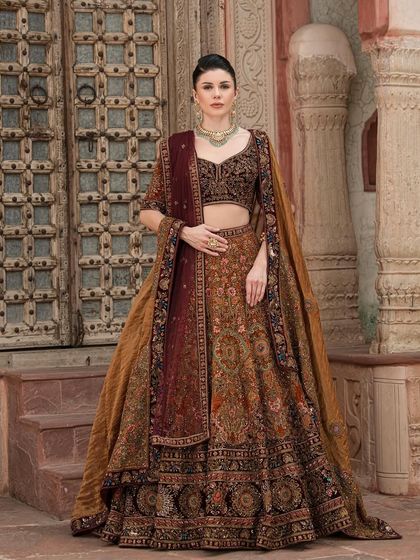 Another shot from our "Bridal Saga" campaign. The rich velvet dupatta adds a touch of luxury to this beautifully crafted bridal lehenga.