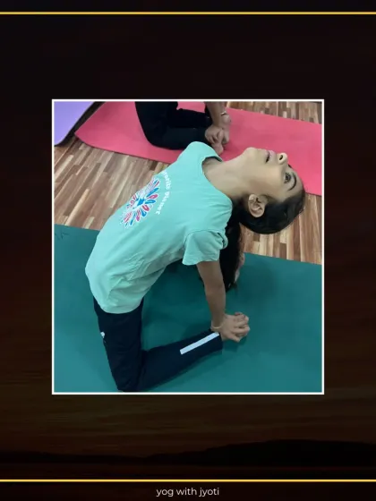 Another young student practicing Camel Pose, showing focus and determination.