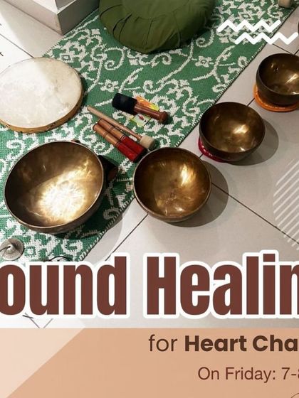 A close-up of the tools we use for our Heart Chakra Sound Healing sessions, including Tibetan singing bowls and a shamanic drum, all set up for an evening of emotional release and balance.