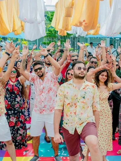 A high-energy group dance at the pool party. We ensure the music and vibe are perfect for an unforgettable party.