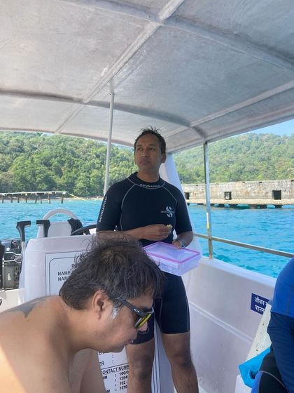 Moments from our Andaman dive trips, showing everything from gearing up at the dive center to relaxing on the boat between dives.