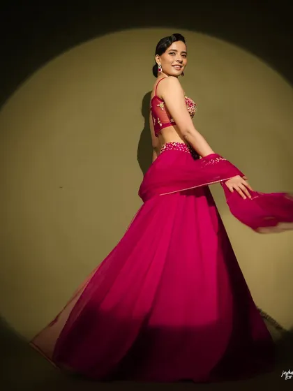 A dynamic shot capturing movement and the beautiful flow of the outfit. The makeup look is versatile enough for both stills and motion.