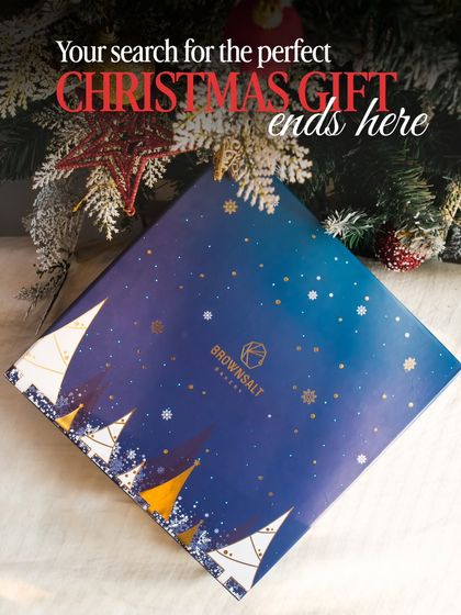 "Your search for the perfect Christmas gift ends here." This image showcases the beautiful, starry-night-themed lid of our Christmas gift box, promising a magical experience inside.