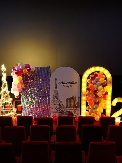 Imagine surprising your loved one with a private theatre screening. We decorated the entire venue with a Paris theme, including a light-up Eiffel Tower and marquee numbers, to create a truly cinematic and unforgettable birthday experience.