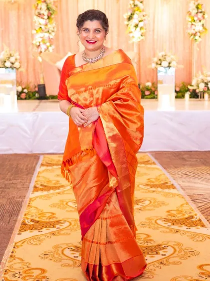 My lovely client Anchita at a wedding. I gave her a classic look with a bold red lip and a traditional braided updo.