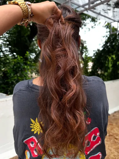 Getting her ready for a work trip with a professional yet stylish look. These 'Almond Brown' tresses are chic and sophisticated, with just enough color to feel fresh and confident.