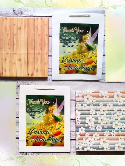 For a Tinkerbell-themed party, I provided these stationery sets wrapped in beautiful floral and wood-patterned paper, all packed in a personalized paper bag.