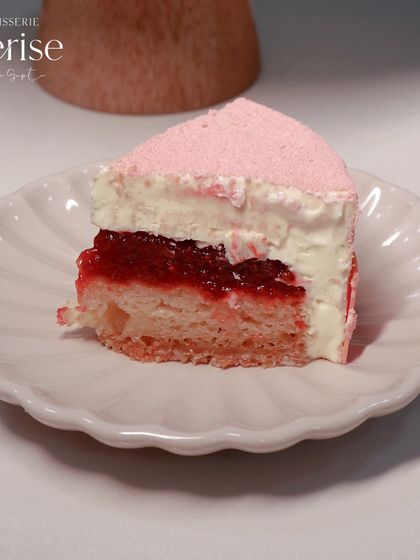 A detailed look at the layers of my Strawberry Fields entremet: fresh strawberry compote, vanilla mascarpone mousse, almond crumble, and a light vanilla sponge.