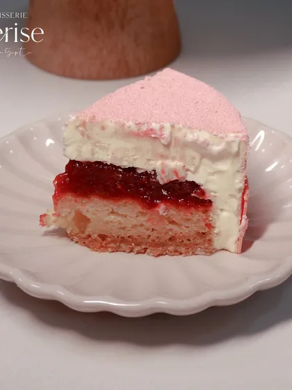 A detailed look at the layers of my Strawberry Fields entremet: fresh strawberry compote, vanilla mascarpone mousse, almond crumble, and a light vanilla sponge.