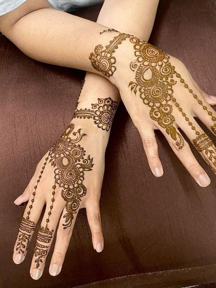 The same delicate and graceful design as seen in a previous video, now as a still image. The beaded chains and simple cuff are perfect for an understated look.