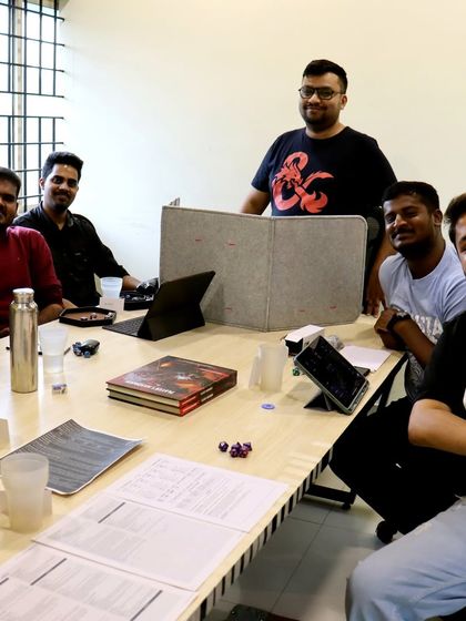 A team gathers for a Dungeons & Dragons one-shot campaign in our private meeting room. It's a perfect example of how my spaces can be used for team-building and fun, not just work.