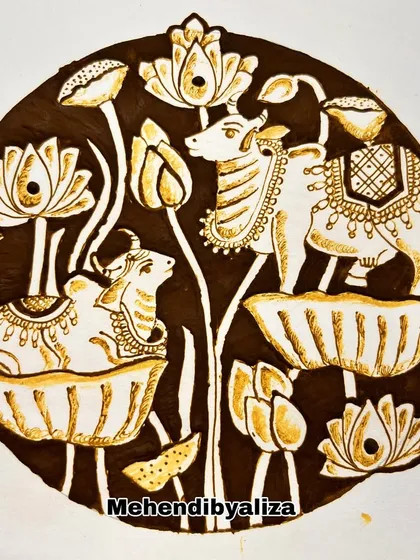 The final filled-in version of the cow and lotus art piece. The contrast is stunning.