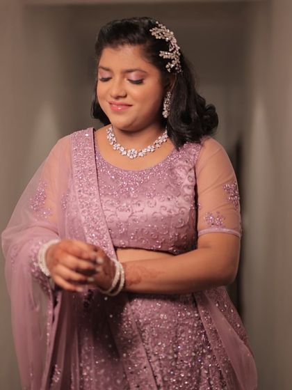 Glammed up for her sister's wedding. I understand that the sider's makeup is just as important, and it was a joy to create this radiant look with stunning eyes and a complementary hairstyle for her.