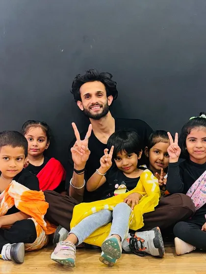 Our instructors are part of the fun. Here is our trainer Akshay with the Little Groovers batch (below 6 years). We believe in creating a friendly and supportive environment where kids feel comfortable, happy, and ready to learn.