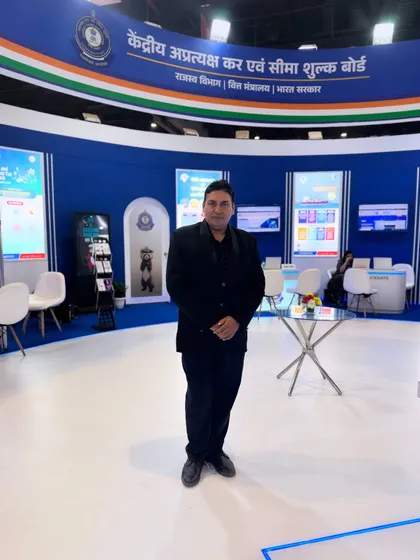 At the Central Board of Indirect Taxes and Customs booth during a trade fair. I often perform for government and public sector events.