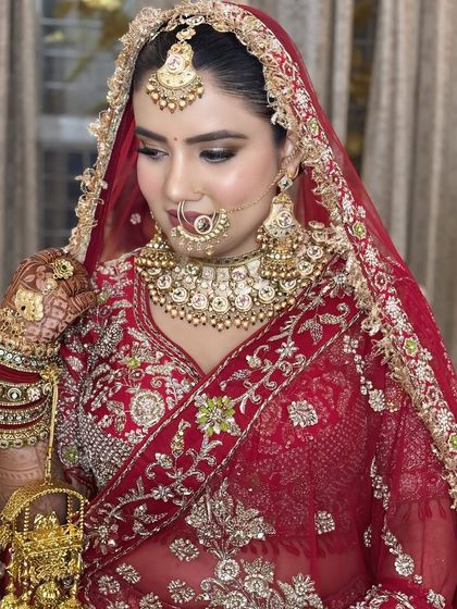 A beautiful three-quarter profile shot, showing off the contour and highlight, as well as the intricate details of her jewelry.