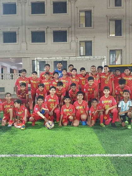 A group photo of our players with Pawan V. Pattem after an inspiring and educational defending session.