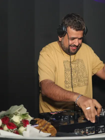 A candid moment of me enjoying the music while DJing at Bangtan Lounge. When the DJ is having fun, everyone has fun.