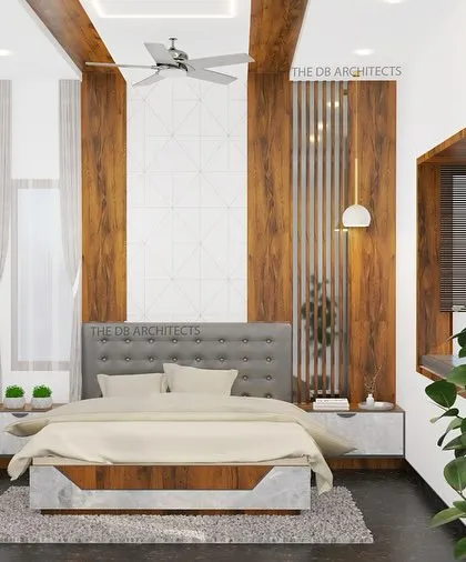 A 3D render of a master bedroom design, showcasing a tufted grey headboard against a backdrop of wood paneling and geometric wallpaper. The design includes elegant ceiling beams and a bay window seating area for a touch of luxury.