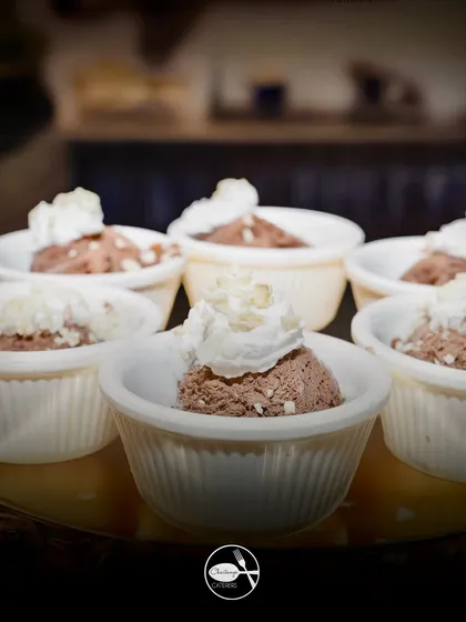 I handcraft my own ice creams for events, like this Chocolate Brownie Fudge flavour. It's rich, creamy, and full of brownie chunks, topped with whipped cream for an extra touch of indulgence.