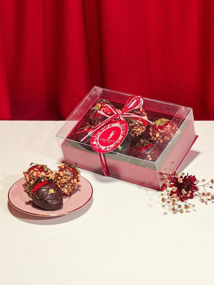 A box of our chocolate-dipped strawberries, a simple yet decadent treat for someone special.