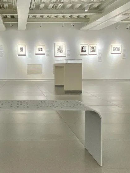 A view of a gallery at the Museum of Art and Photography (MAP), showing the custom-designed benches and clean, open layout. The interior architecture is intended to be understated, keeping the focus on the art collection.