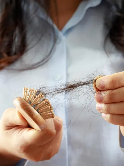 Seeing a brush full of hair can be distressing, and it's a common concern that brings many people to my clinic. I want you to know that effective, scientifically-backed solutions are available to address the root cause of your hair fall.