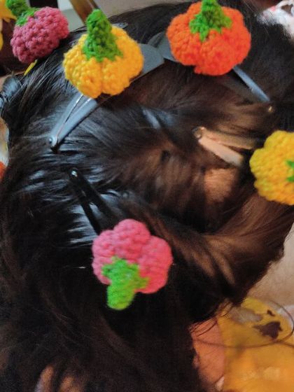 Getting into the Halloween spirit with these custom-made pumpkin hairclips for my daughter. Perfect for a festive hairdo.