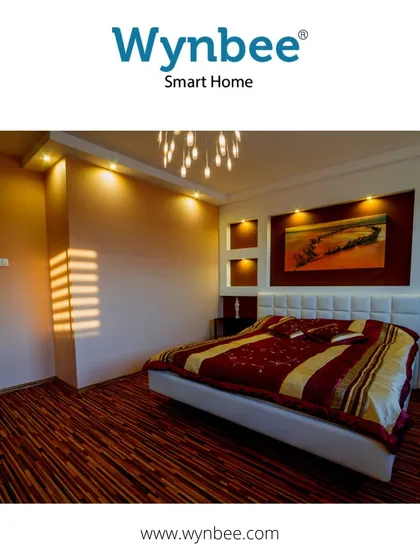 Set the perfect mood in your bedroom with your voice. This room uses a combination of recessed spotlights and a decorative ceiling fixture to create a warm, inviting blend of light that's perfect for winding down at night.