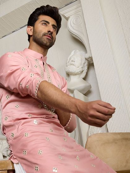 The striking pink ethnic kurta, a piece designed to be a standout reflection of your personal style and confidence.