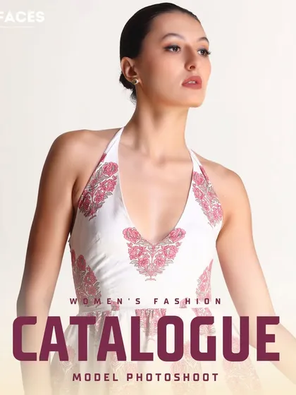 This image features a model in a white halter-neck top with a delicate pink floral print. The elegant pose is perfect for a sophisticated fashion lookbook.