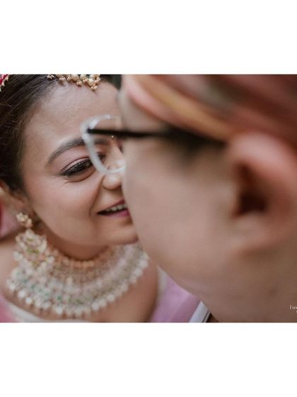 An intimate close-up of the bride and her father, sharing a special moment.