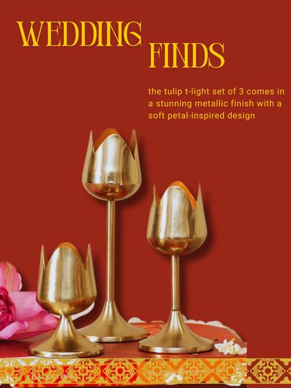 Inspired by soft petals, this tulip t-light set of three comes in a stunning metallic finish, adding a modern yet delicate touch to your wedding decor.