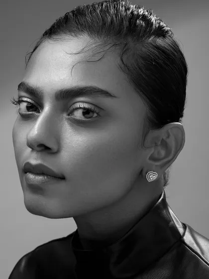 For fine jewellery, my approach is to let the piece speak for itself. This black and white portrait uses clean, sculptural light to highlight the exquisite craftsmanship of the diamond earrings, creating a timeless and powerful image where the focus remains purely on the design and the emotion it evokes.