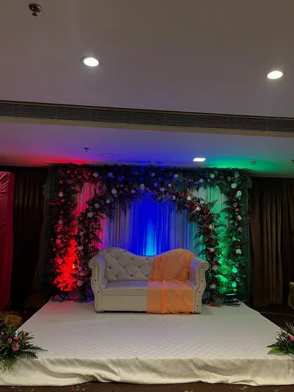 A wide shot of the ring ceremony stage, showing its placement in the banquet hall.
