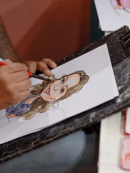 We can arrange for unique entertainment like a live caricature artist, providing guests with a personalized and artistic party favor to take home.
