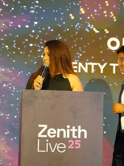 A side-profile shot from the podium at Zenith Live 25, showing my focus while delivering the opening remarks for the IT conference.