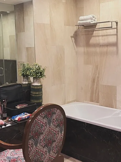 The bathroom setup at the student accommodation, with a makeup kit ready for practice. We create an environment that encourages constant learning and creativity.