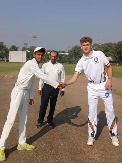 We provide our trainees with international exposure by hosting teams from other countries. This image shows the captains' handshake before a competitive match against the U-16 team from South Africa, fostering sportsmanship and global experience.