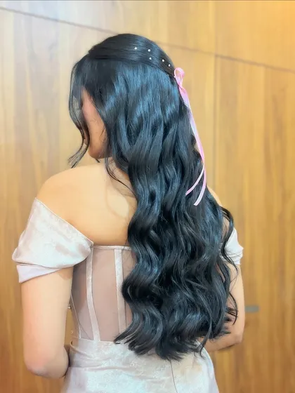 Another angle of the ribbon and crystal half-updo, showing the soft waves and delicate details.