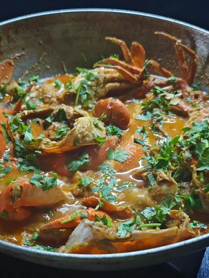 My Malvani Crab Curry is a messy, hands-on, and incredibly rewarding experience. The secret to its spectacular taste is the authentic Malvani masala I use, which makes the sweet crab meat sing.