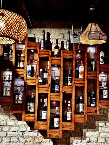 Our unique heart-shaped bar shelf, stocked and ready for our BYOB guests.