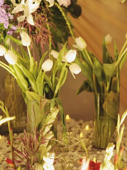 A close-up of the white tulips used in the floral arrangements, adding a touch of classic elegance.