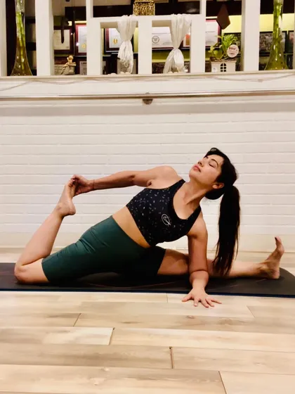 A variation of Eka Pada Rajakapotasana (One-Legged King Pigeon Pose), this deep hip opener helps release stored emotions. It's a way to reconnect with your body and show yourself love through mindful movement.