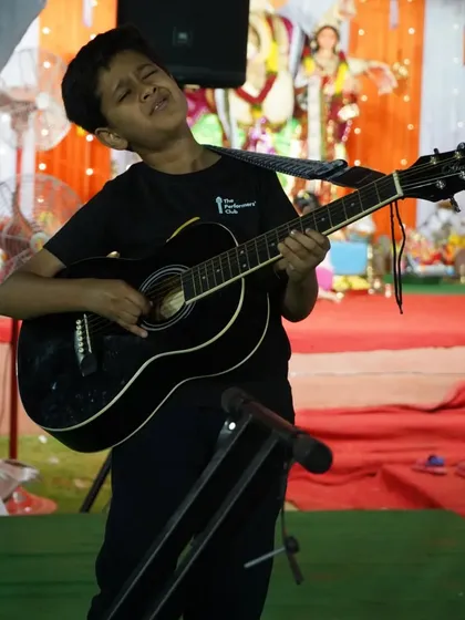 The passion is visible on his face. A young student feeling every note he plays during his live performance.