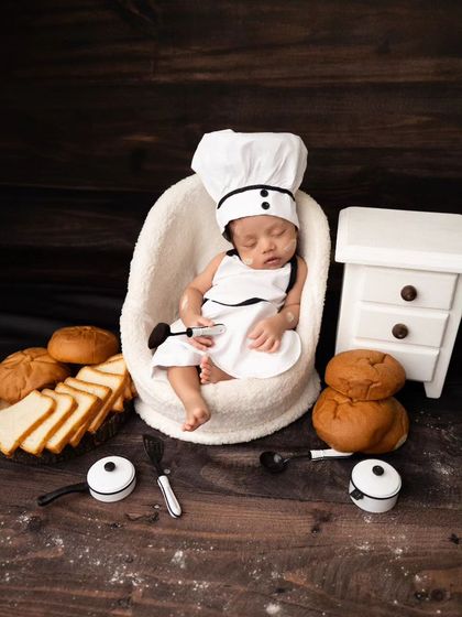A wider shot of the chef setup, showing the full arrangement of props that create this adorable baking scene.