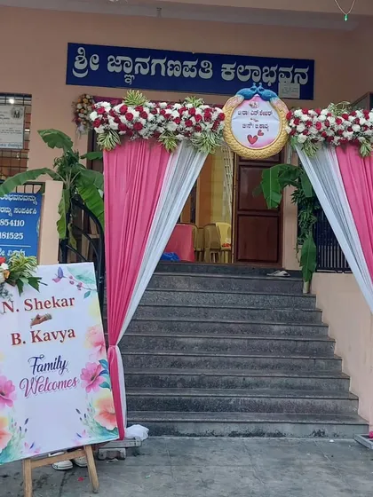 A closer look at the personalized welcome sign and the floral details on the entrance arch. We coordinate the colors and style to match the overall theme of your wedding.