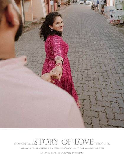 A creative "follow me to" shot, with the bride leading the groom down a cobblestone street.