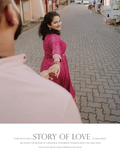A creative "follow me to" shot, with the bride leading the groom down a cobblestone street.