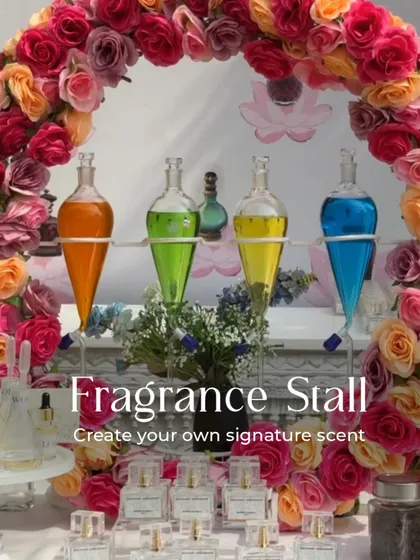 Another beautiful fragrance stall setup, this time with a vibrant floral arch. We can tailor the design of our interactive stations to perfectly match the overall theme and decor of your event.